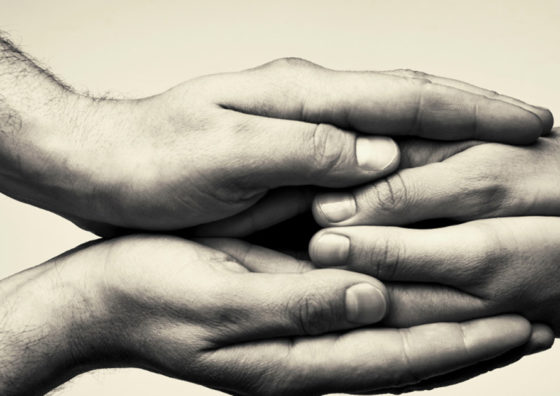 clasping hands