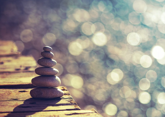 pebbles stacked on pier