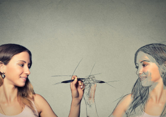 photo illustration of girl drawing herself