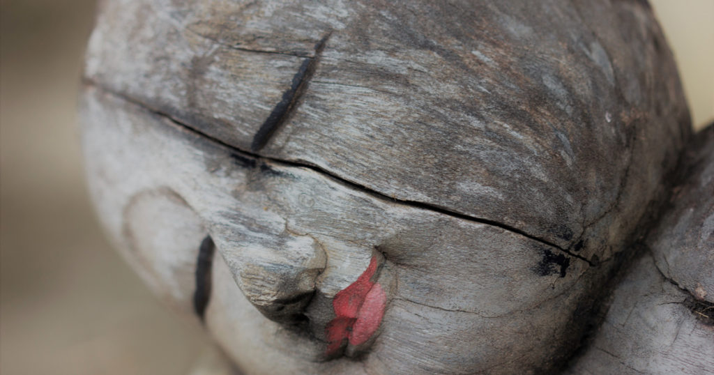 wooden buddha head