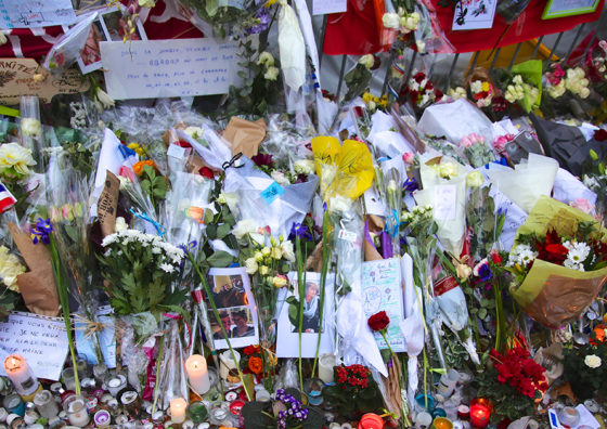 flowers and candles at memorial