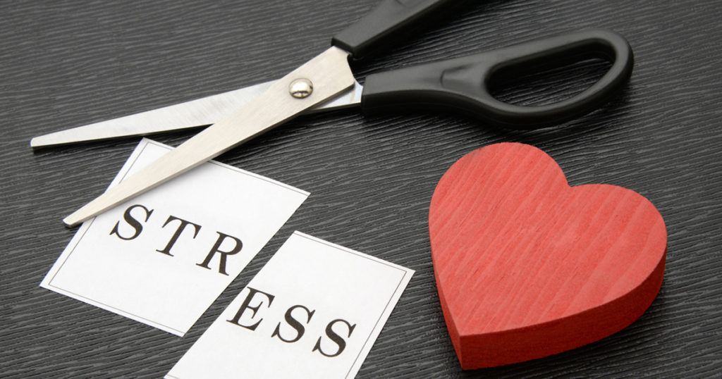 scissors heart and cut paper reading stress