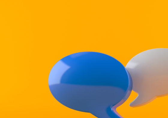 blue voice bubble in front of white voice bubble